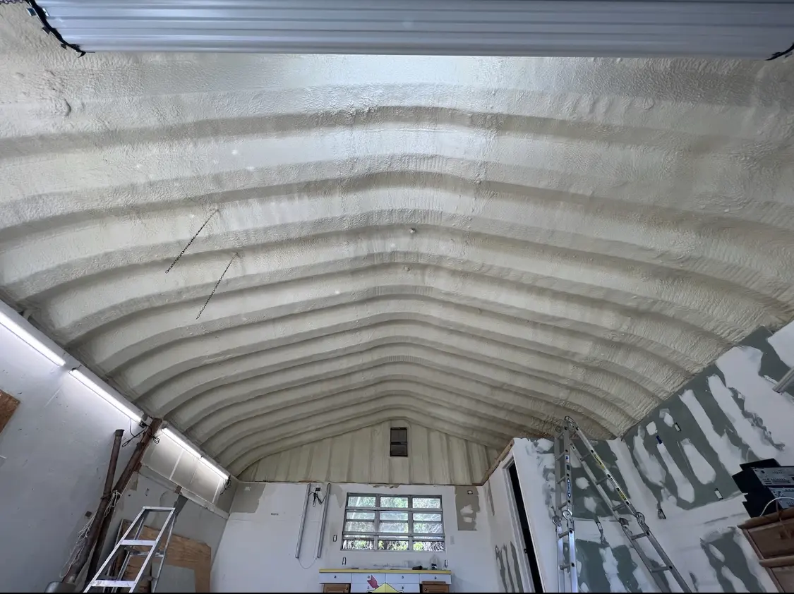 Spray polyurethane foam applied to the underside of a metal roof deck in Swatara